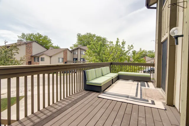 a balcony with a couch