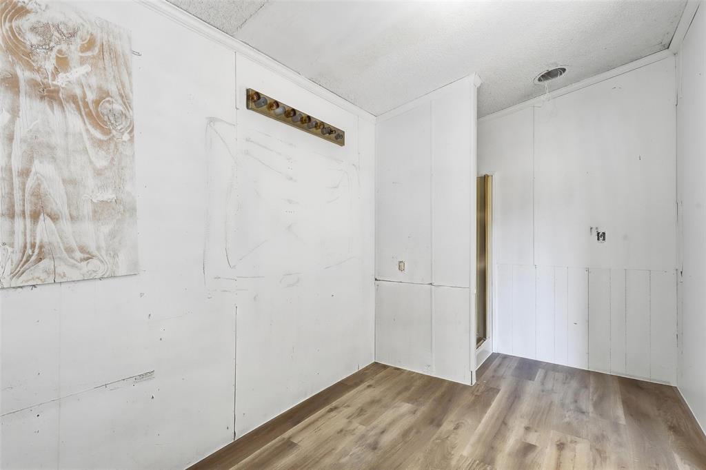 1491 County Road 319, Unit B Cleburne, TX 76033 - Photo 14 of 24 a view of an empty room