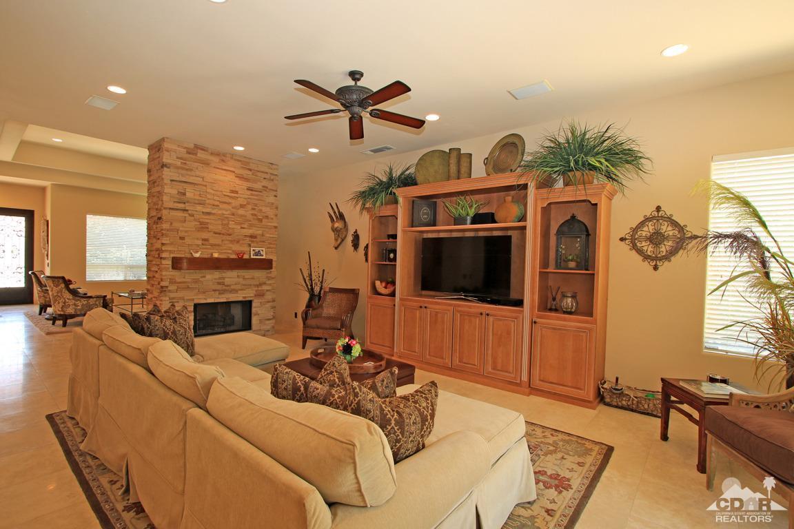 4 Mesquite Ridge Lane Rancho Mirage, CA 92270 - Photo 13 of 62 a living room with furniture fireplace and a flat screen tv
