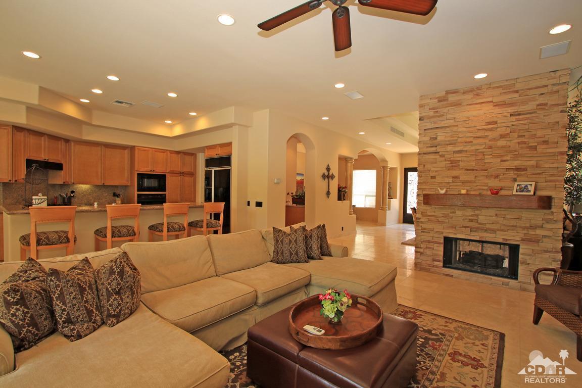 4 Mesquite Ridge Lane Rancho Mirage, CA 92270 - Photo 14 of 62 a living room with furniture and a fireplace