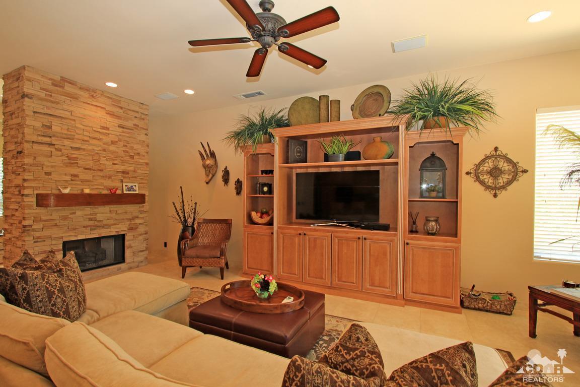 4 Mesquite Ridge Lane Rancho Mirage, CA 92270 - Photo 18 of 62 a living room with furniture and a flat screen tv