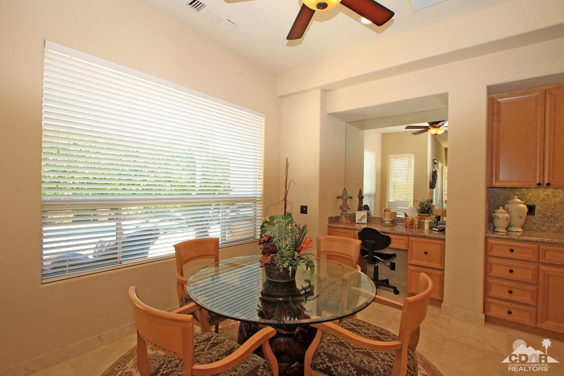 4 Mesquite Ridge Lane Rancho Mirage, CA 92270 - Photo 23 of 62 a dining room with furniture and a window