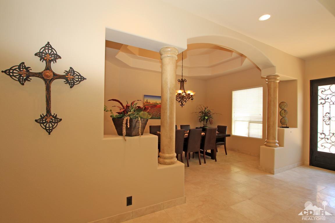 4 Mesquite Ridge Lane Rancho Mirage, CA 92270 - Photo 26 of 62 a view of a dining room with furniture and chandelier