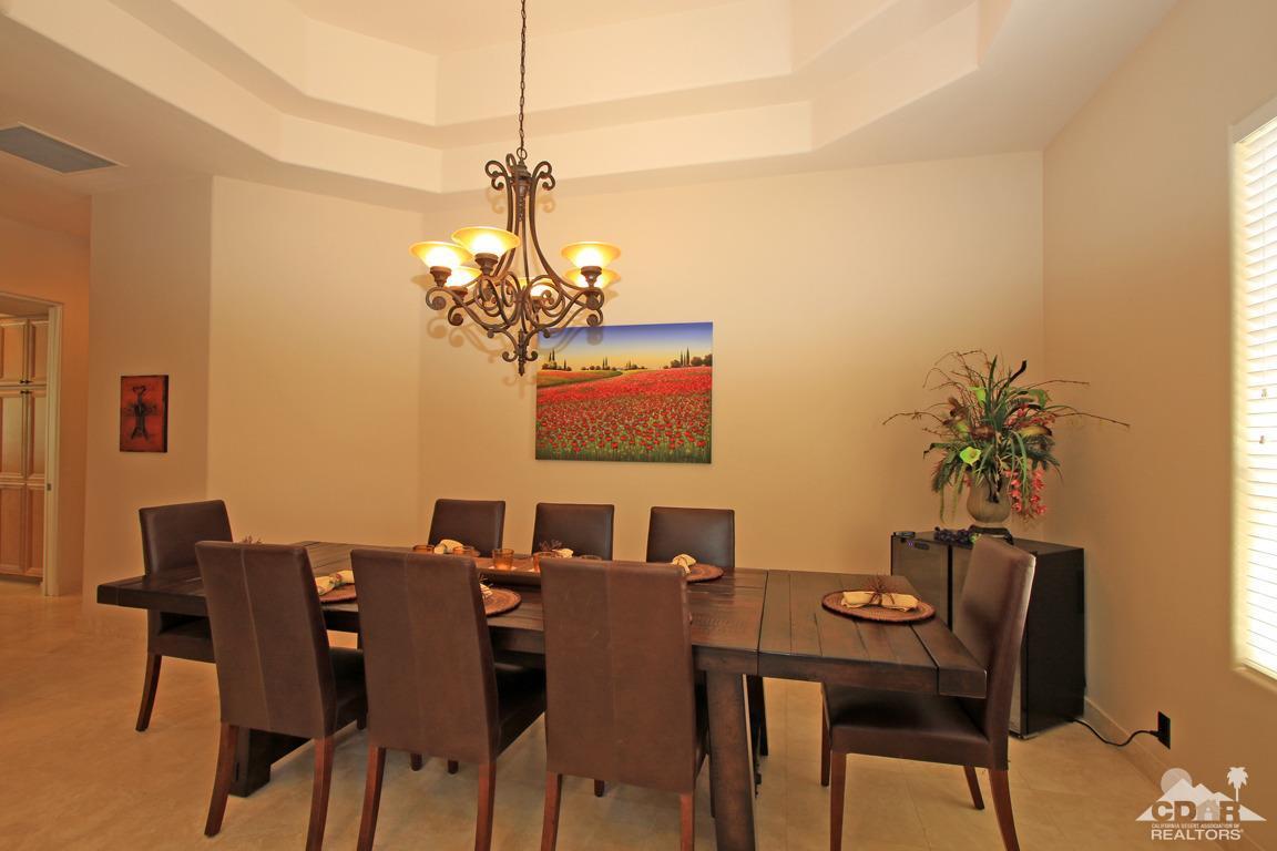 4 Mesquite Ridge Lane Rancho Mirage, CA 92270 - Photo 27 of 62 a view of a dining room with furniture and chandelier
