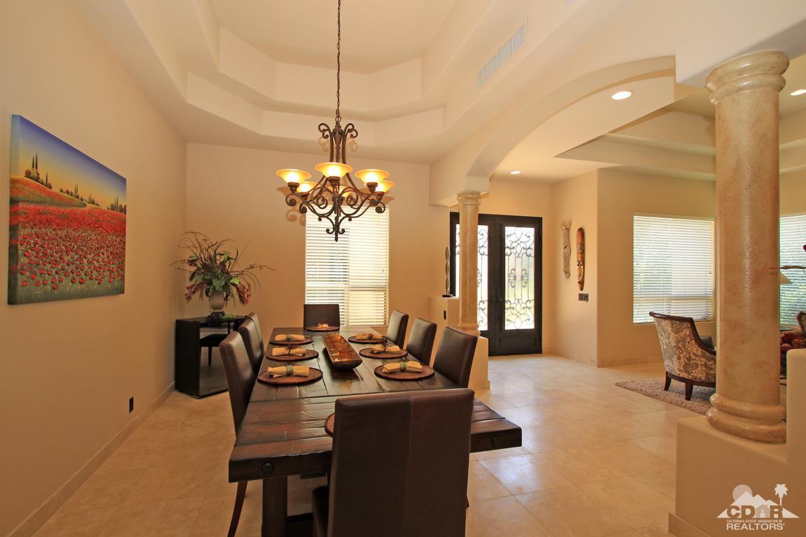 4 Mesquite Ridge Lane Rancho Mirage, CA 92270 - Photo 28 of 62 a view of a dining room with furniture and chandelier
