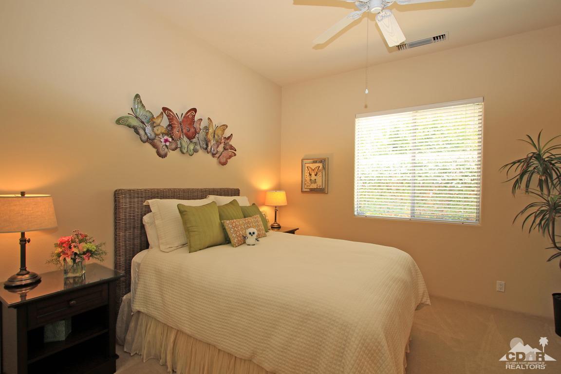 4 Mesquite Ridge Lane Rancho Mirage, CA 92270 - Photo 37 of 62 a bedroom with a bed and a window