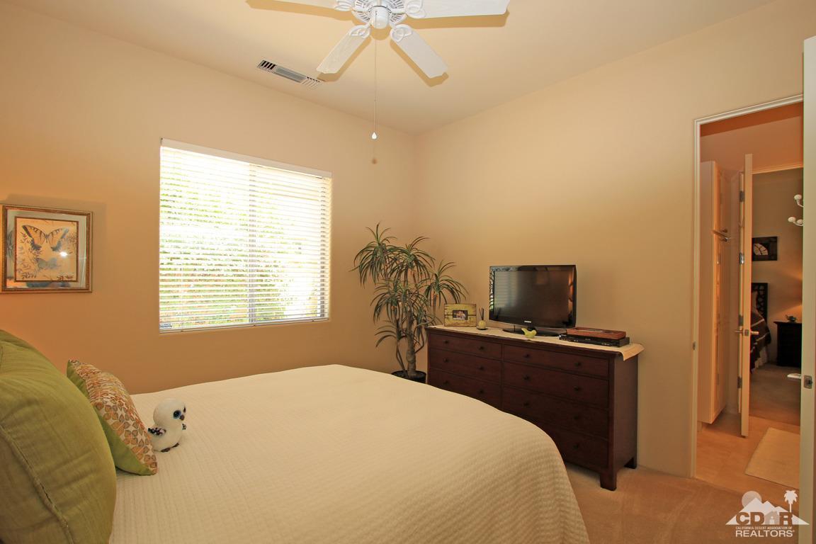 4 Mesquite Ridge Lane Rancho Mirage, CA 92270 - Photo 38 of 62 a bedroom with a bed and a flat screen tv
