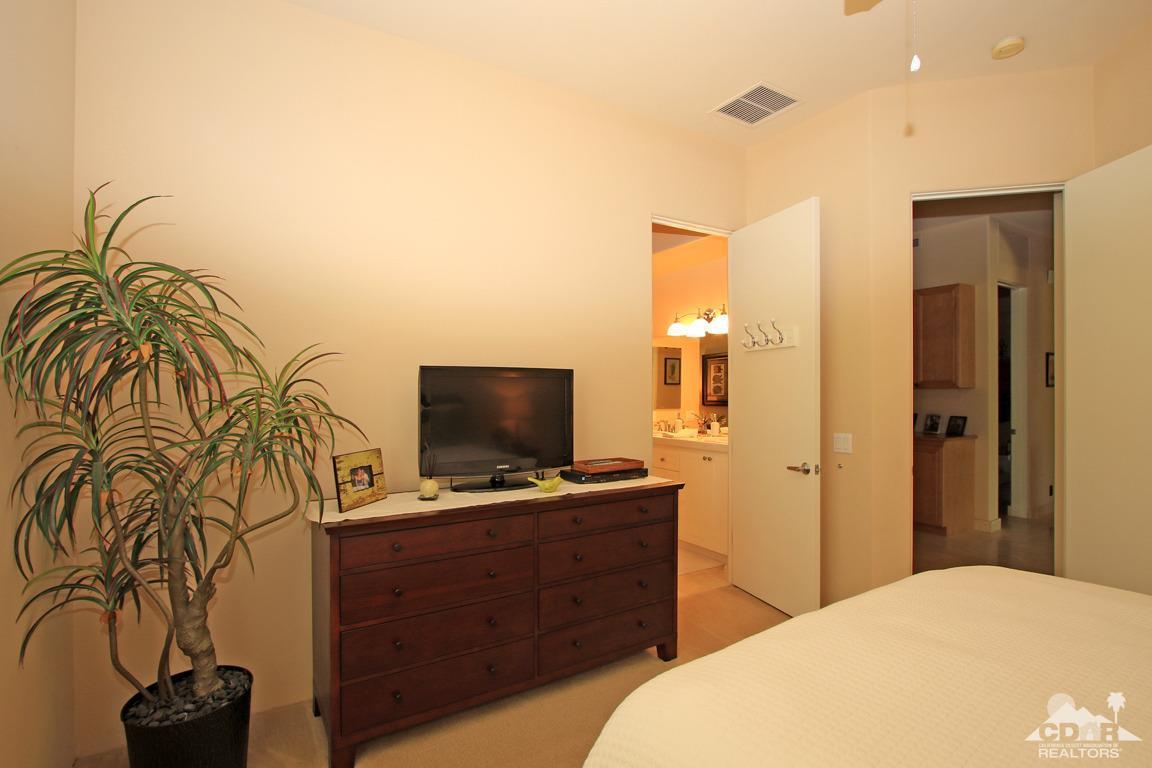 4 Mesquite Ridge Lane Rancho Mirage, CA 92270 - Photo 39 of 62 a bedroom with a bed and a flat screen tv