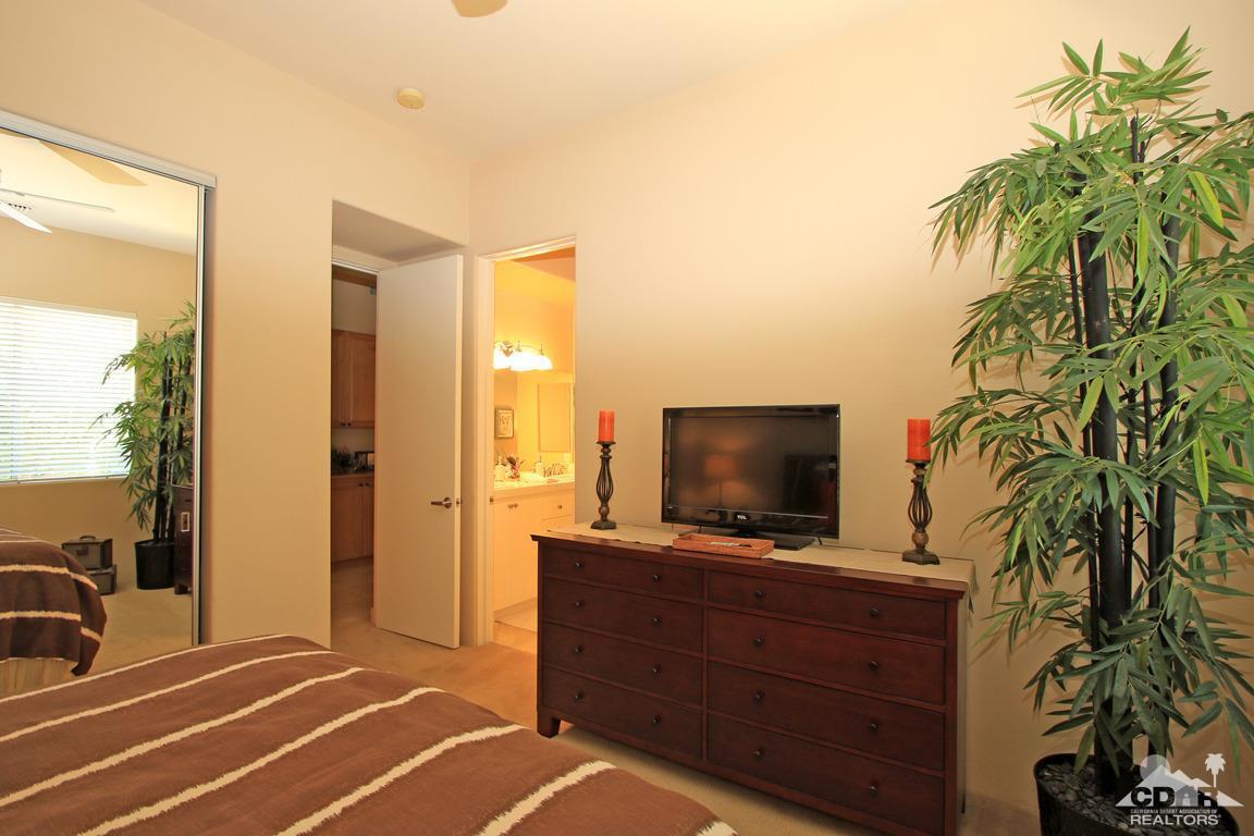 4 Mesquite Ridge Lane Rancho Mirage, CA 92270 - Photo 42 of 62 a room with furniture and a flat screen tv