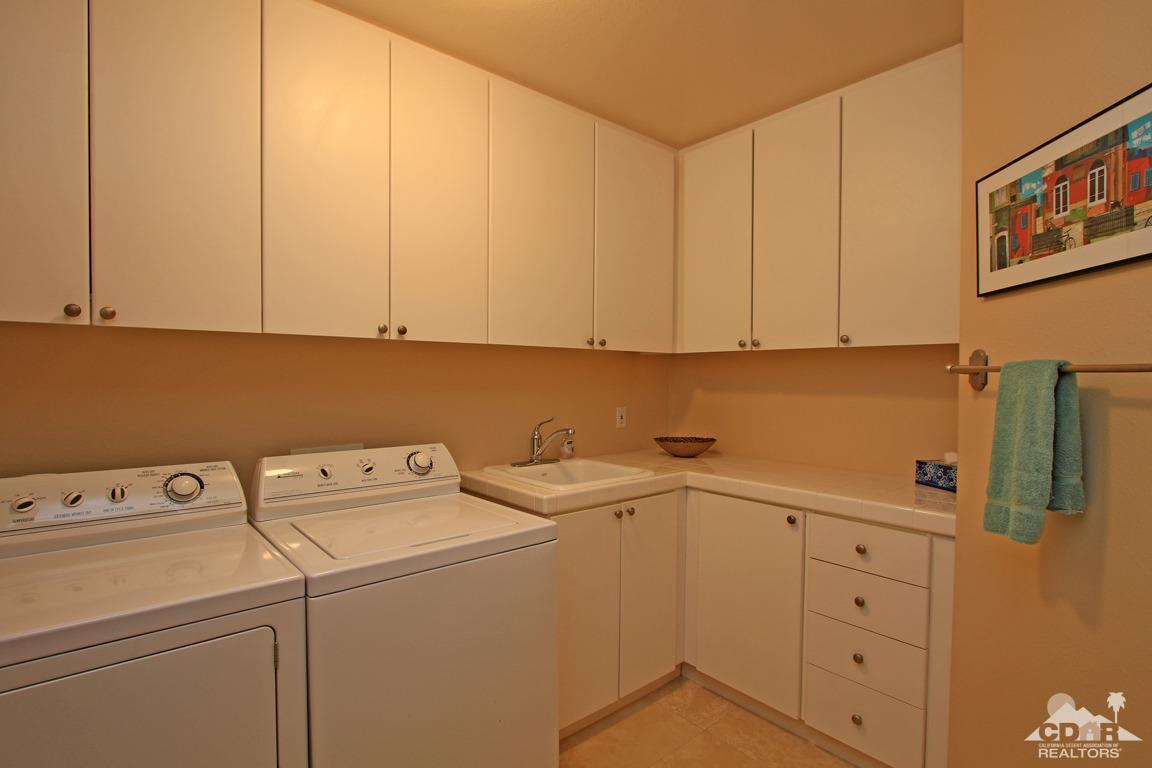 4 Mesquite Ridge Lane Rancho Mirage, CA 92270 - Photo 46 of 62 a utility room with dryer and washer