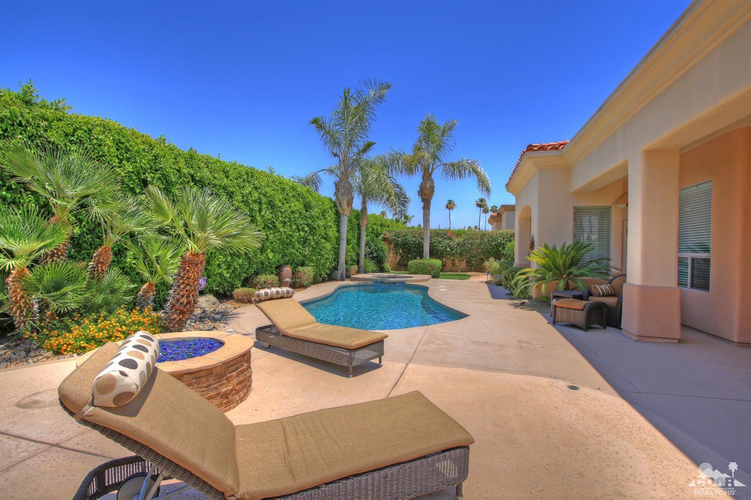 4 Mesquite Ridge Lane Rancho Mirage, CA 92270 - Photo 52 of 62 a view of a patio with couches table and chairs