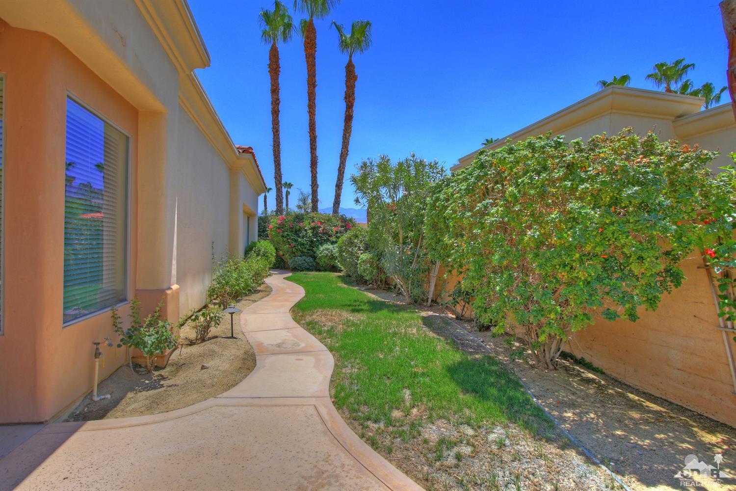 4 Mesquite Ridge Lane Rancho Mirage, CA 92270 - Photo 58 of 62 a view of a pathway with a yard