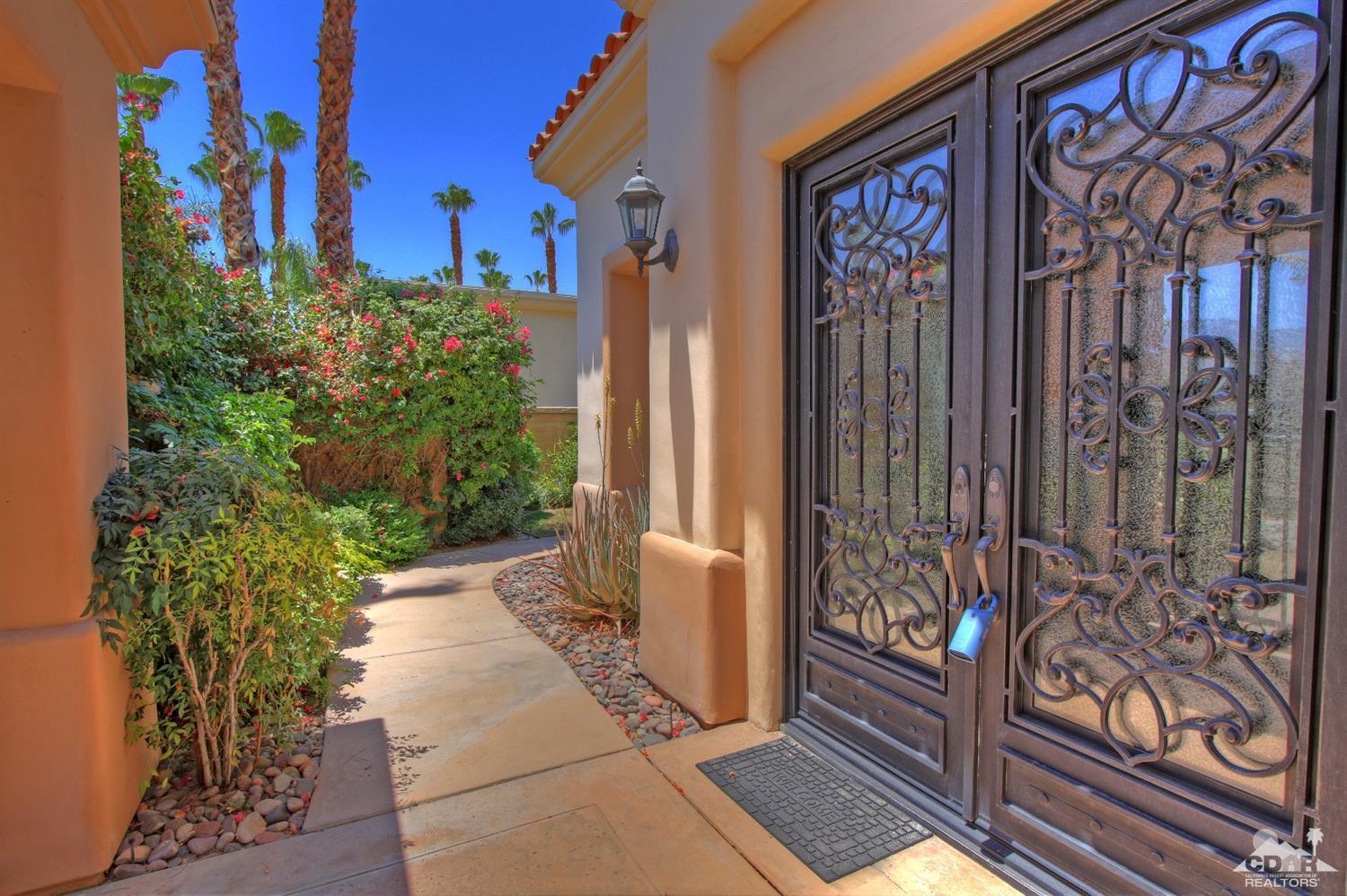 4 Mesquite Ridge Lane Rancho Mirage, CA 92270 - Photo 6 of 62 a front view of a house