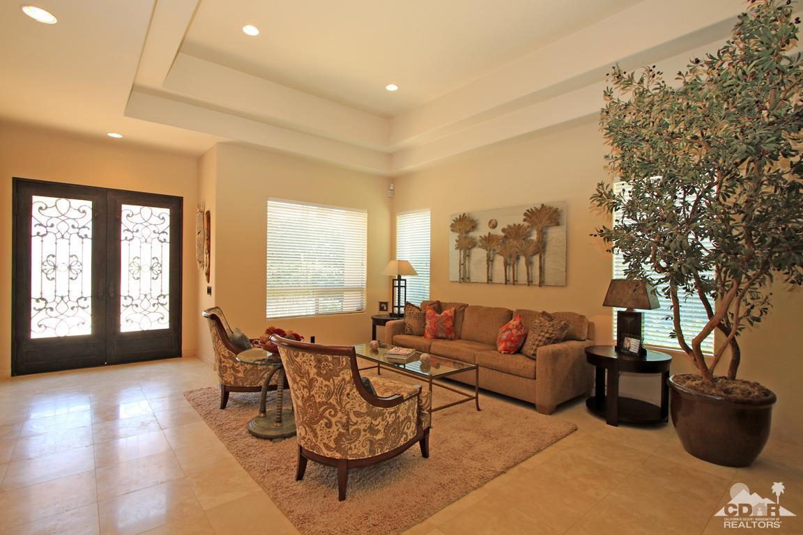 4 Mesquite Ridge Lane Rancho Mirage, CA 92270 - Photo 8 of 62 a living room with furniture and a large window