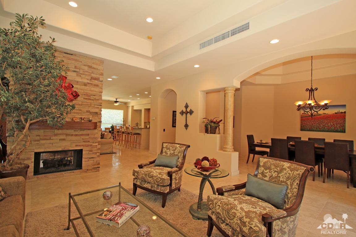 4 Mesquite Ridge Lane Rancho Mirage, CA 92270 - Photo 10 of 62 a living room with furniture and a fireplace