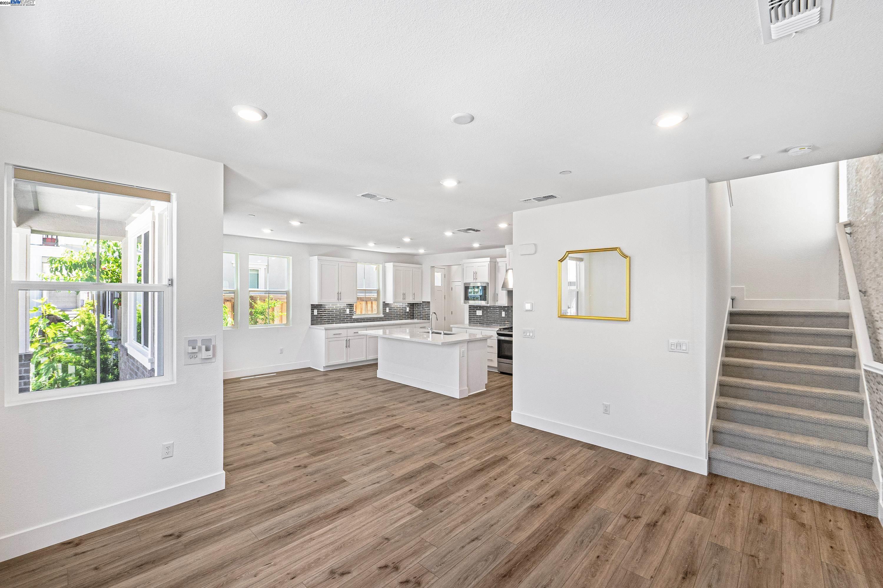 9657 Pontoon Way Newark, CA 94560 - Photo 11 of 46 a view of kitchen with wooden floor