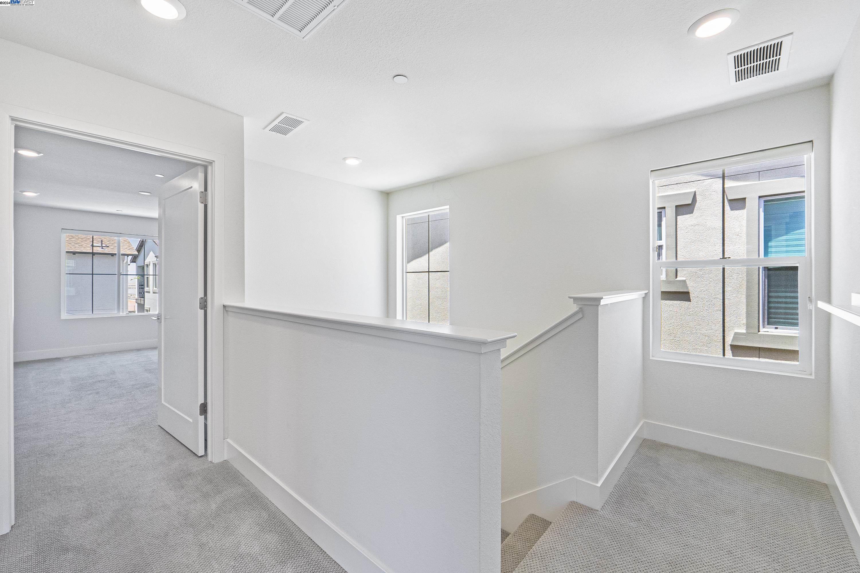 9657 Pontoon Way Newark, CA 94560 - Photo 17 of 46 an empty room with windows