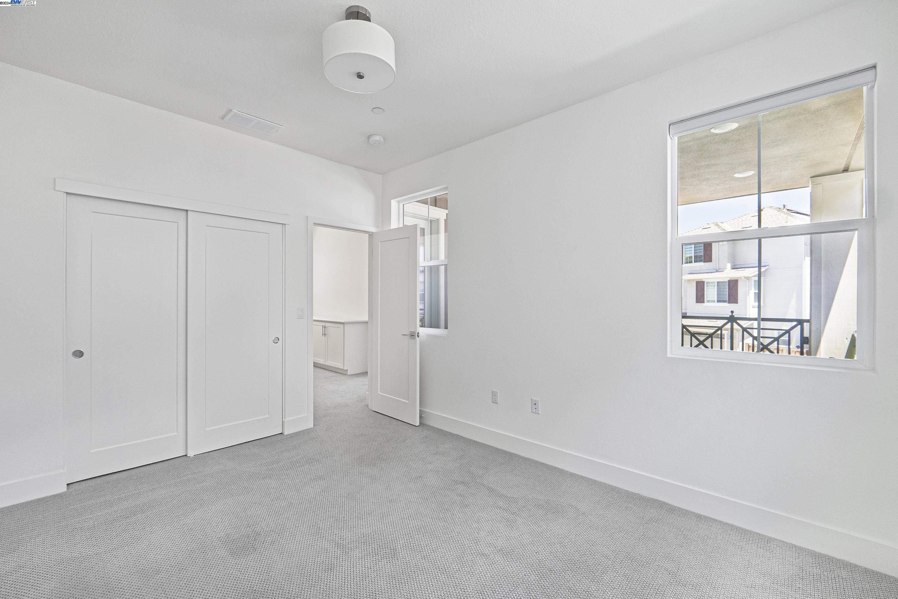 9657 Pontoon Way Newark, CA 94560 - Photo 24 of 46 a view of an empty room with a window