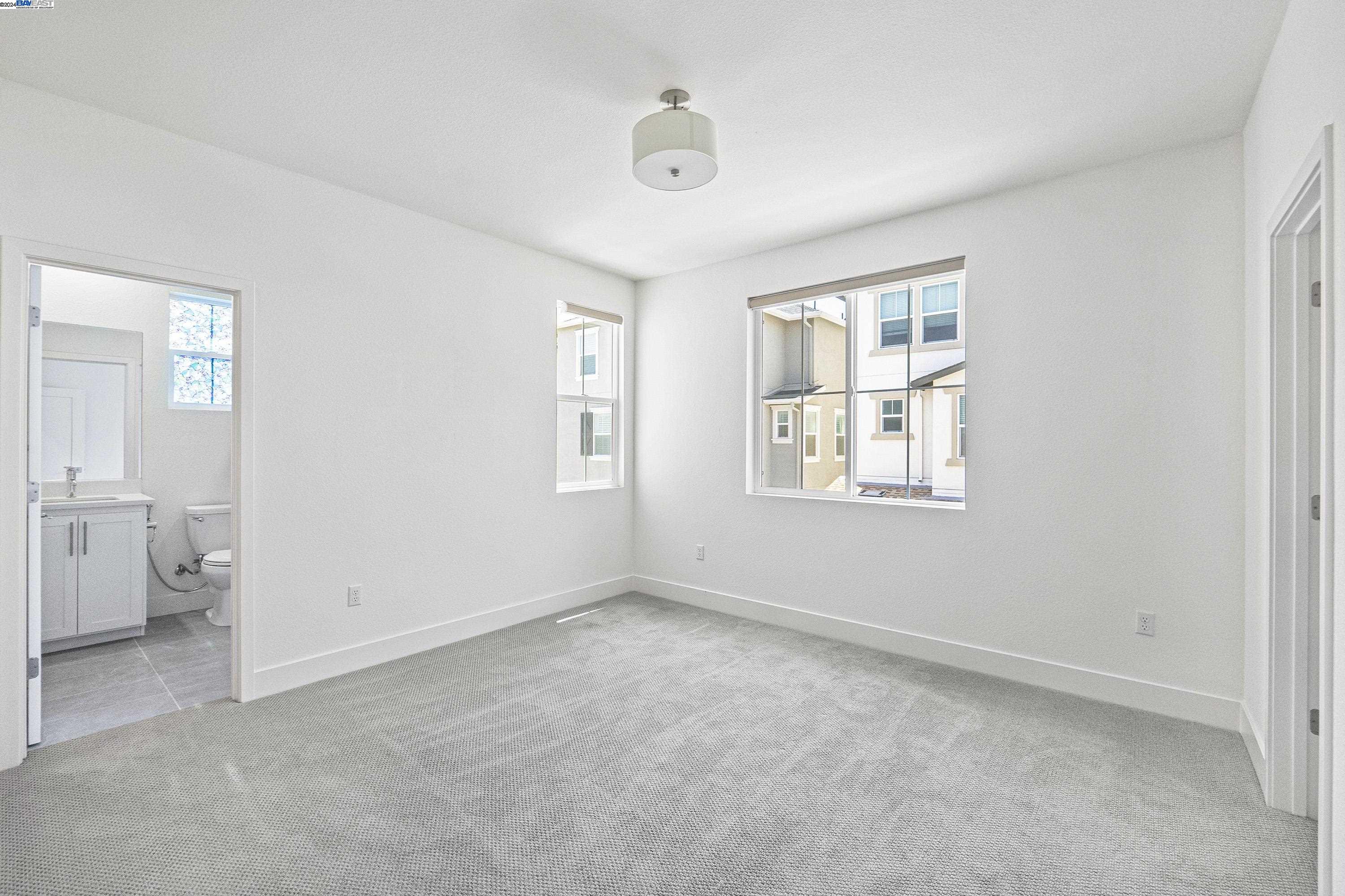 9657 Pontoon Way Newark, CA 94560 - Photo 26 of 46 a view of an empty room with closet and a window