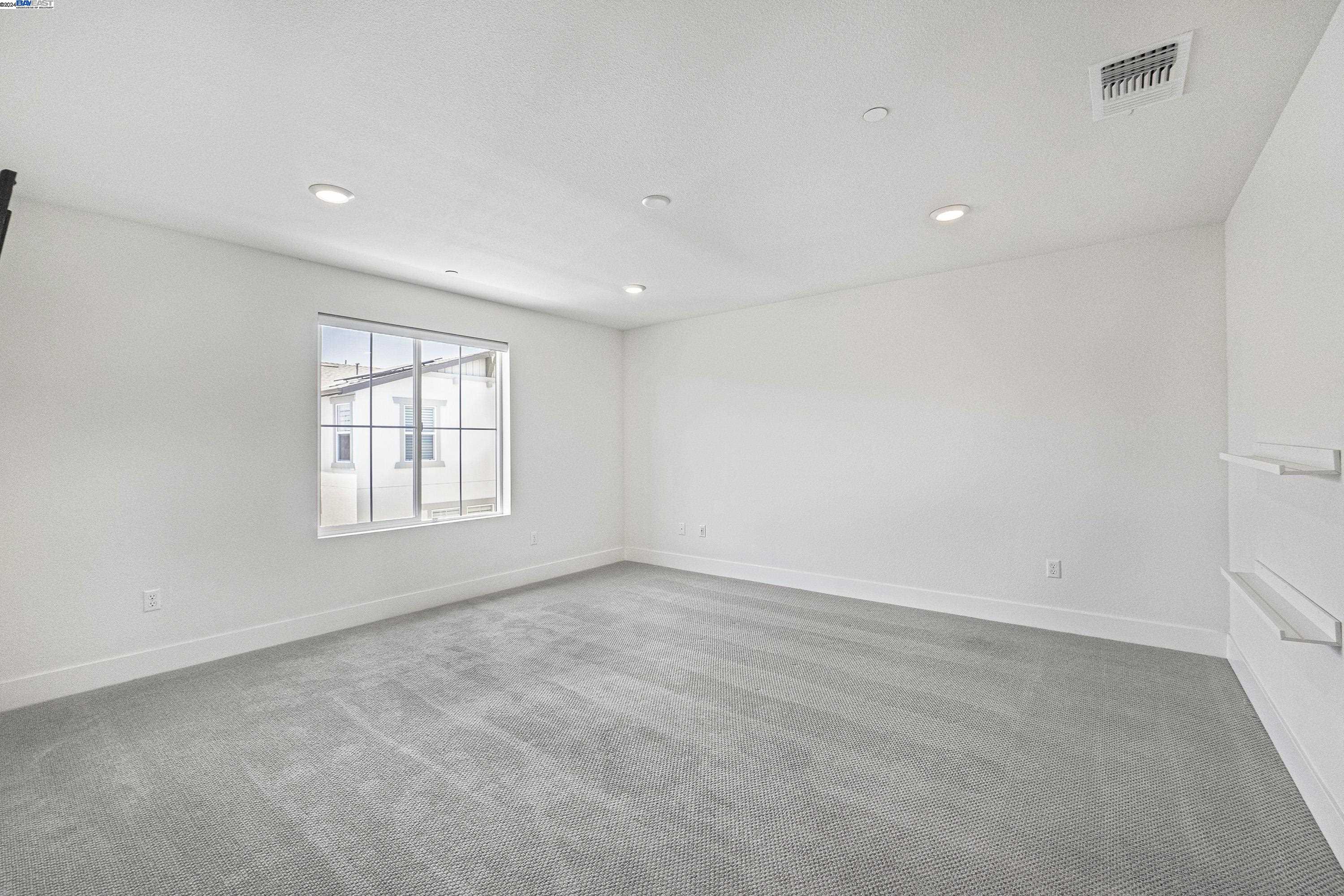 9657 Pontoon Way Newark, CA 94560 - Photo 30 of 46 an empty room with windows