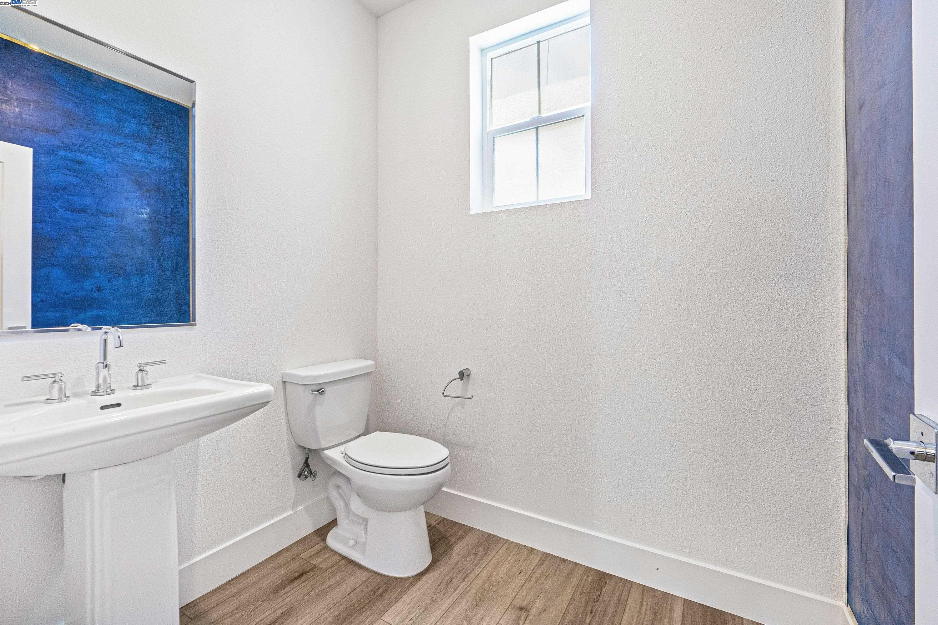 9657 Pontoon Way Newark, CA 94560 - Photo 34 of 46 a bathroom with a sink and a toilet