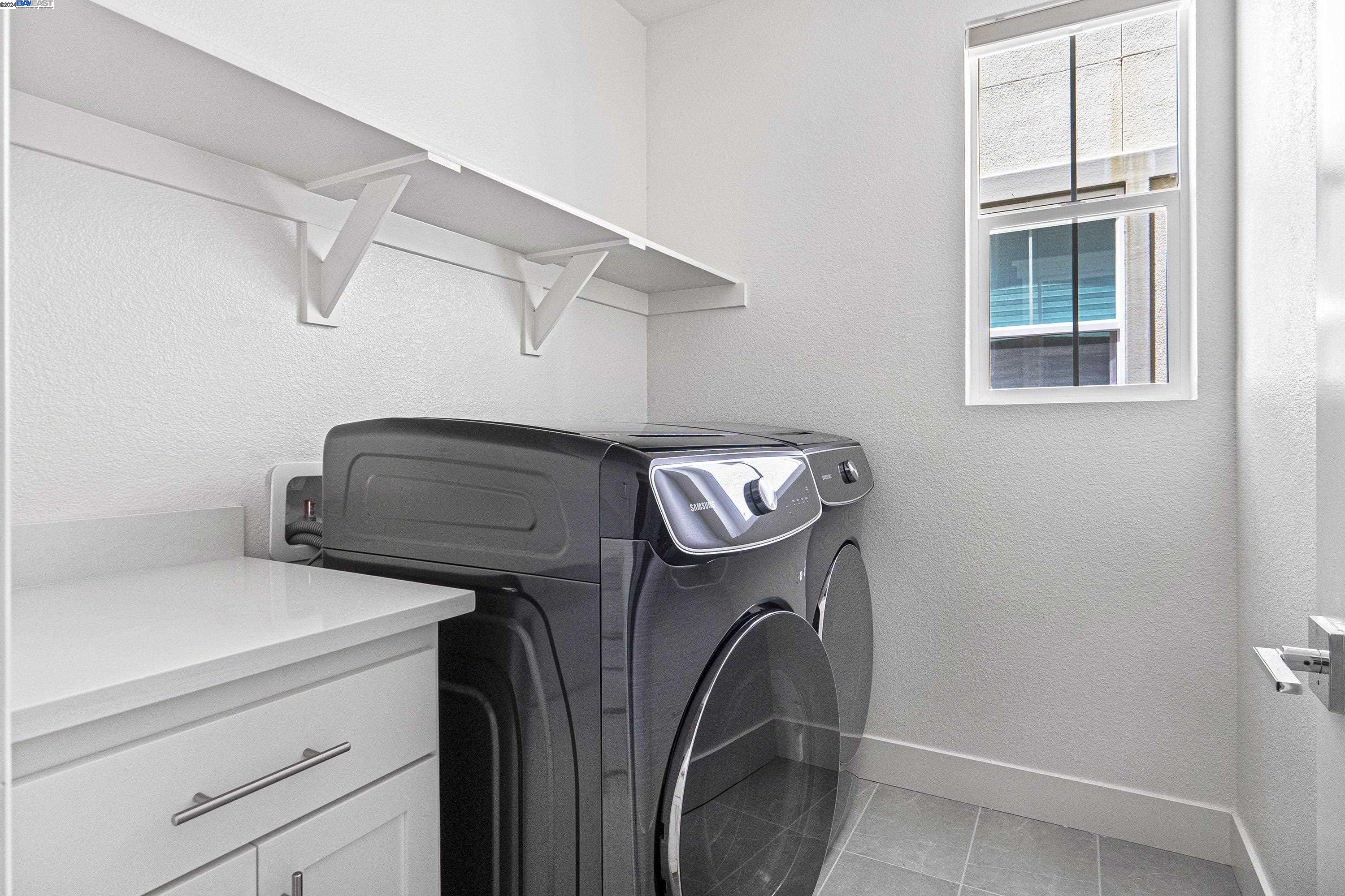9657 Pontoon Way Newark, CA 94560 - Photo 37 of 46 a utility room with dryer and washer