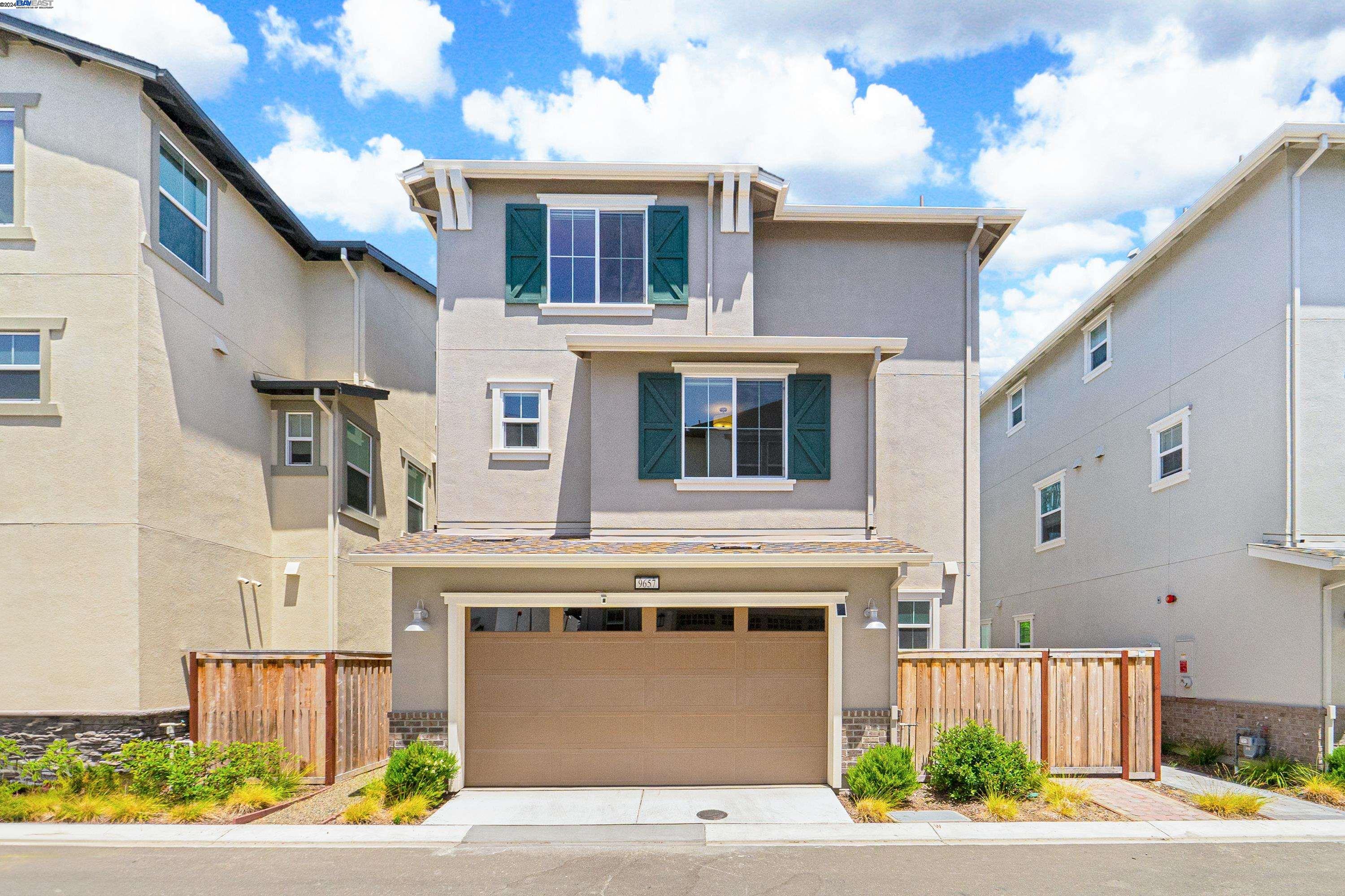 9657 Pontoon Way Newark, CA 94560 - Photo 39 of 46 a front view of a building with a garden and entryway