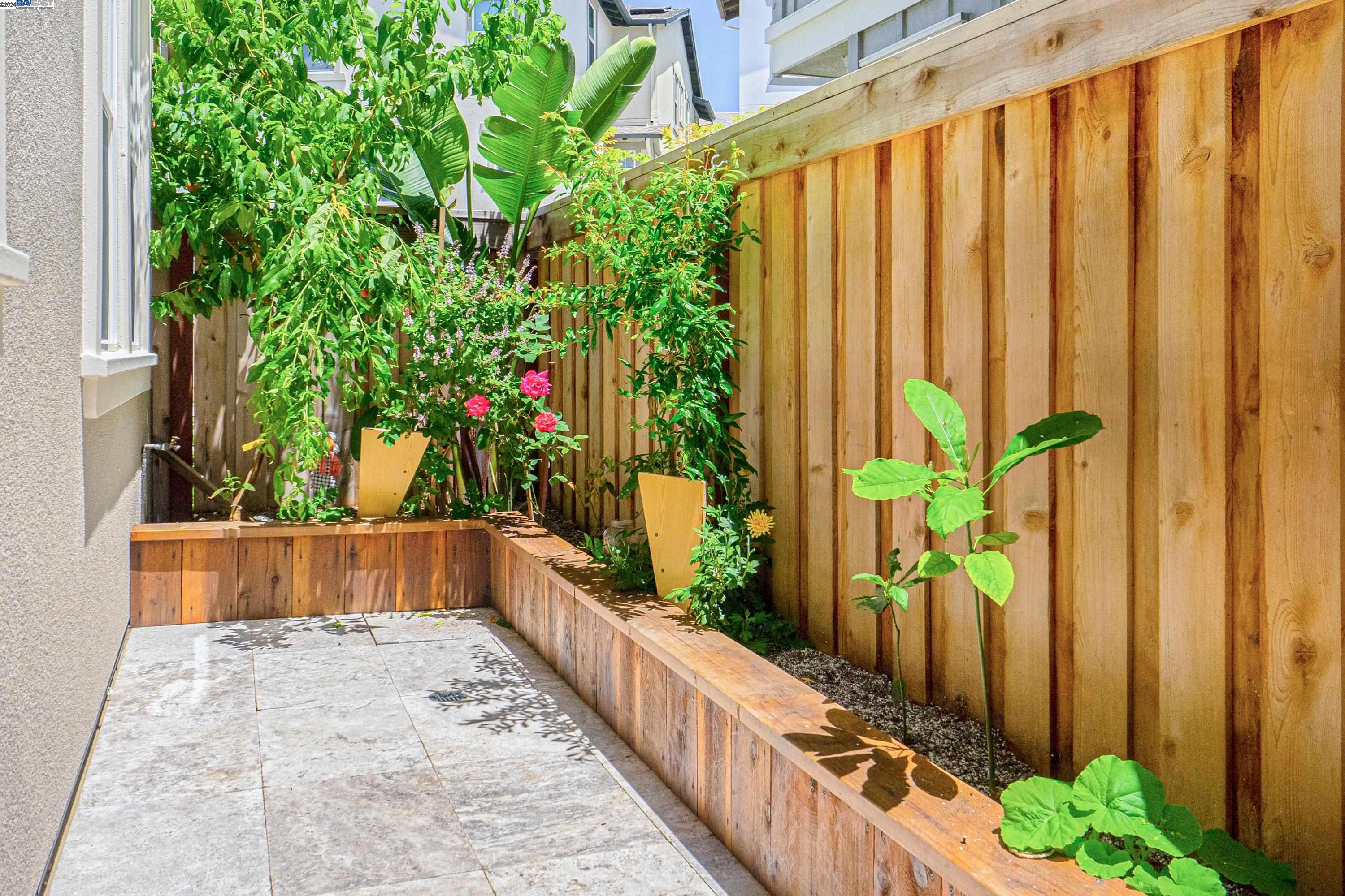 9657 Pontoon Way Newark, CA 94560 - Photo 41 of 46 a view of a pathway of a balcony with flower plants