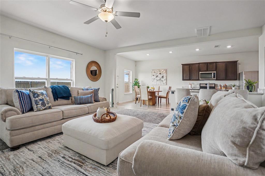 125 Sammy Venus, TX 76084 - Photo 6 of 39 Open-concept living area with a ceiling fan light fixture
