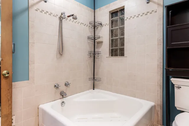 a bathroom with a sink and a shower