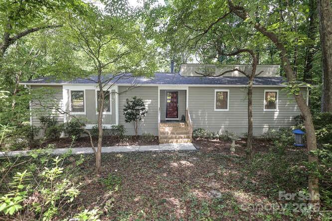 front view of house with a yard