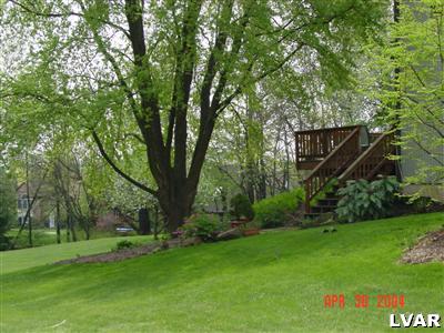 1690 Minesite Road Allentown, PA 18103 - Photo 3 of 32 3 Back deck overlooks large tree lined back yard.