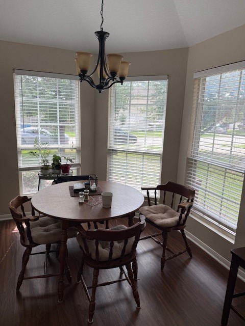 22411 High Point Pines Drive Spring, TX 77373 - Photo 5 of 12 Breakfast area with vinyl tile floors. Chandelier over head. Bay windows for natural lighting.
