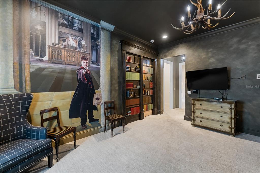 600 Muirfield Loop Reunion, FL 34747 - Photo 40 of 95 a view of a livingroom with furniture and a flat screen tv