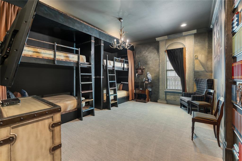 600 Muirfield Loop Reunion, FL 34747 - Photo 41 of 95 a bed room with a bed and furniture