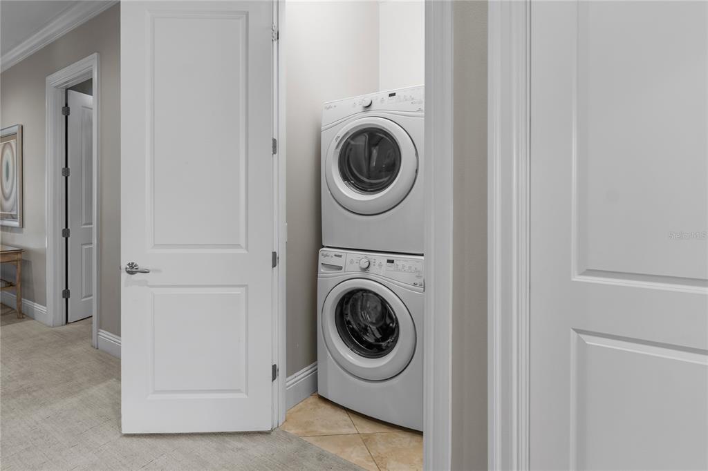 600 Muirfield Loop Reunion, FL 34747 - Photo 75 of 95 a utility room with dryer and washer