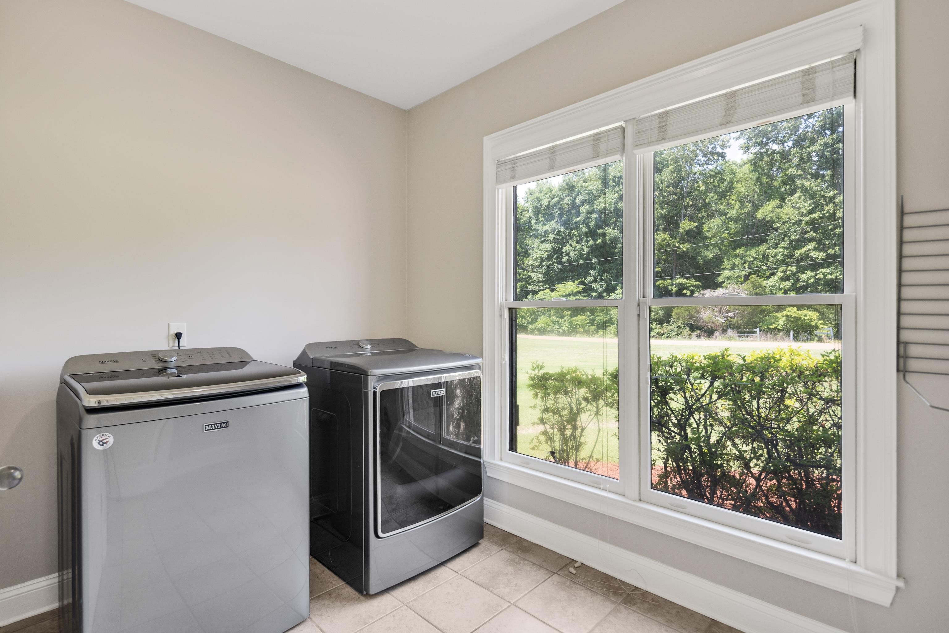 9028 Osborntown Road Arlington, TN 38002 - Photo 20 of 40 a view of washer and dryer in a room