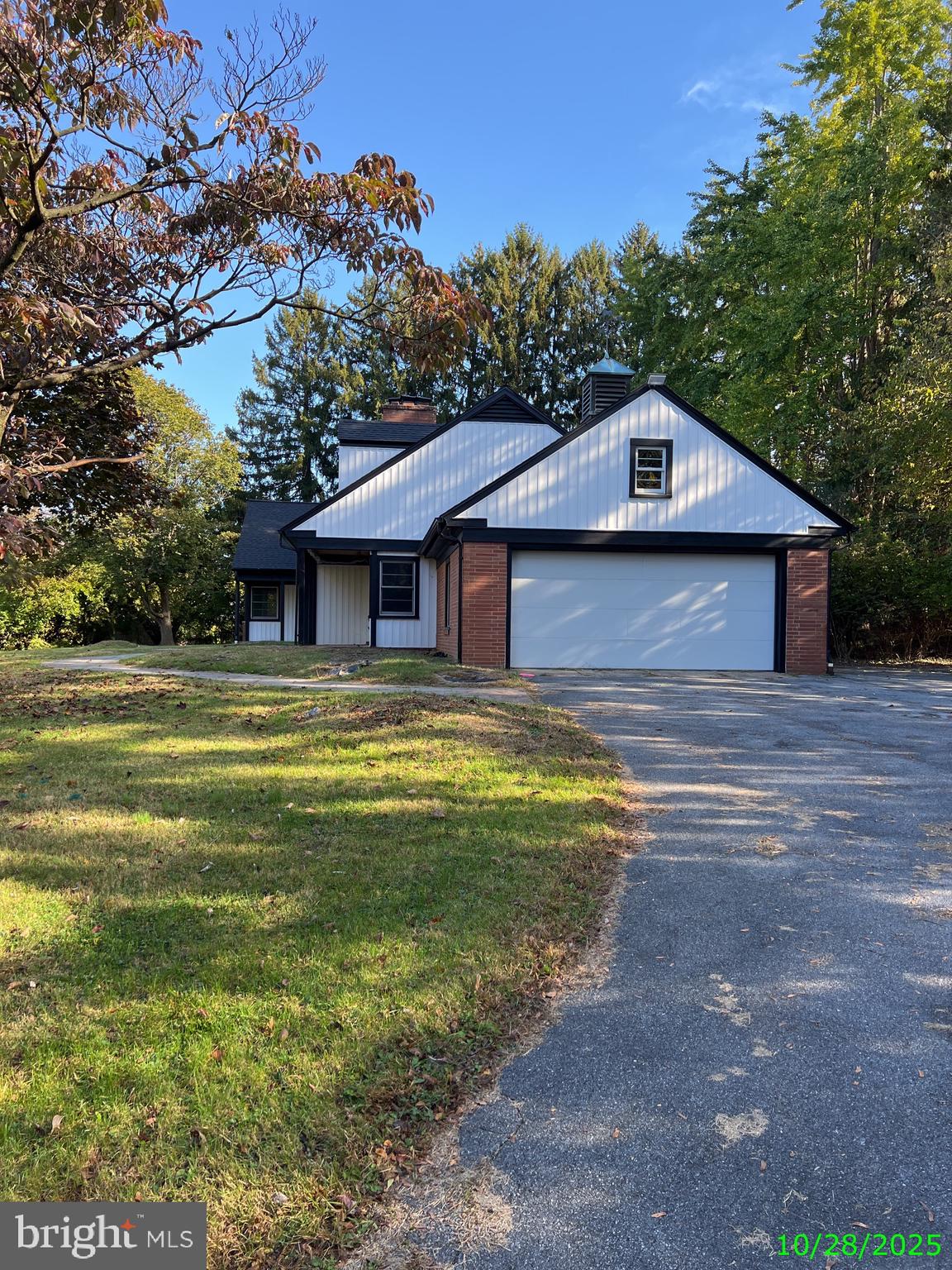 202 Museum Road Shillington, PA 19607 - Photo 3 of 29 a front view of a house with a garden