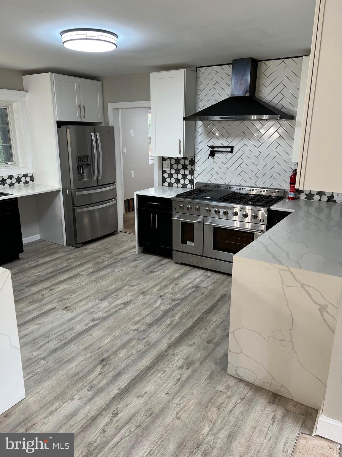 202 Museum Road Shillington, PA 19607 - Photo 9 of 29 a kitchen with stainless steel appliances kitchen island granite countertop a refrigerator stove and oven