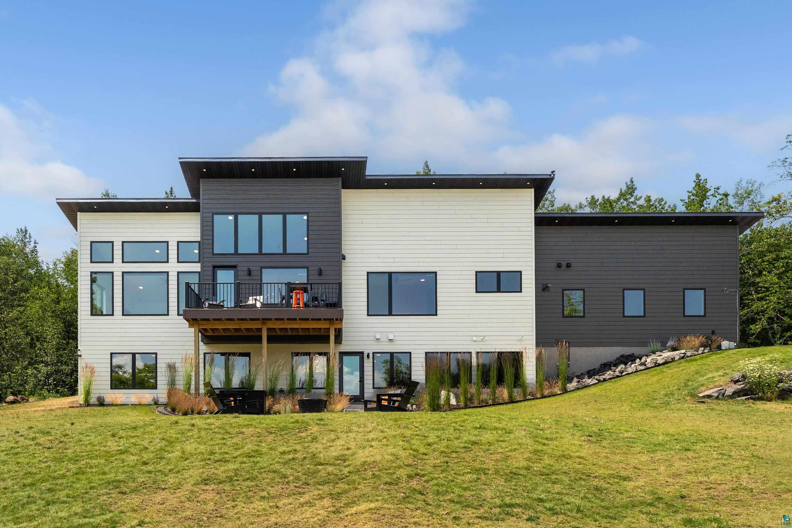 814 Pleasant View Road Duluth, MN 55803 - Photo 36 of 49 Modern architectural exterior featuring contrasting dark and light siding