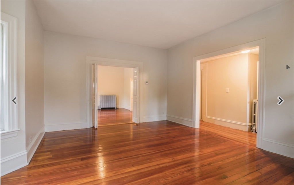 31 Garland Street, Unit 1 Chelsea, MA 02150 - Photo 2 of 9 a view of empty room with wooden floor