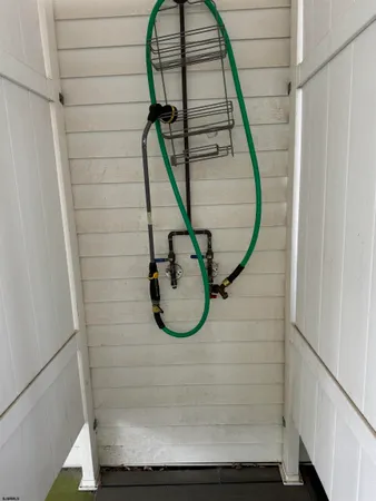 a bathroom with a sink and mirror