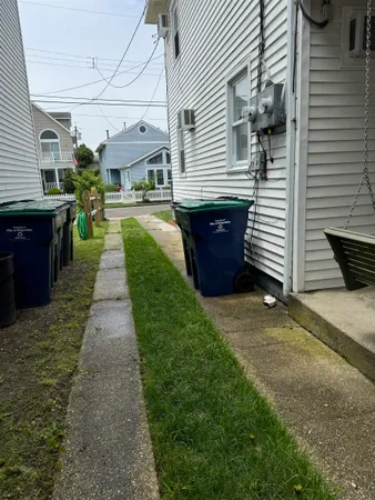 a view of a pathway with a patio