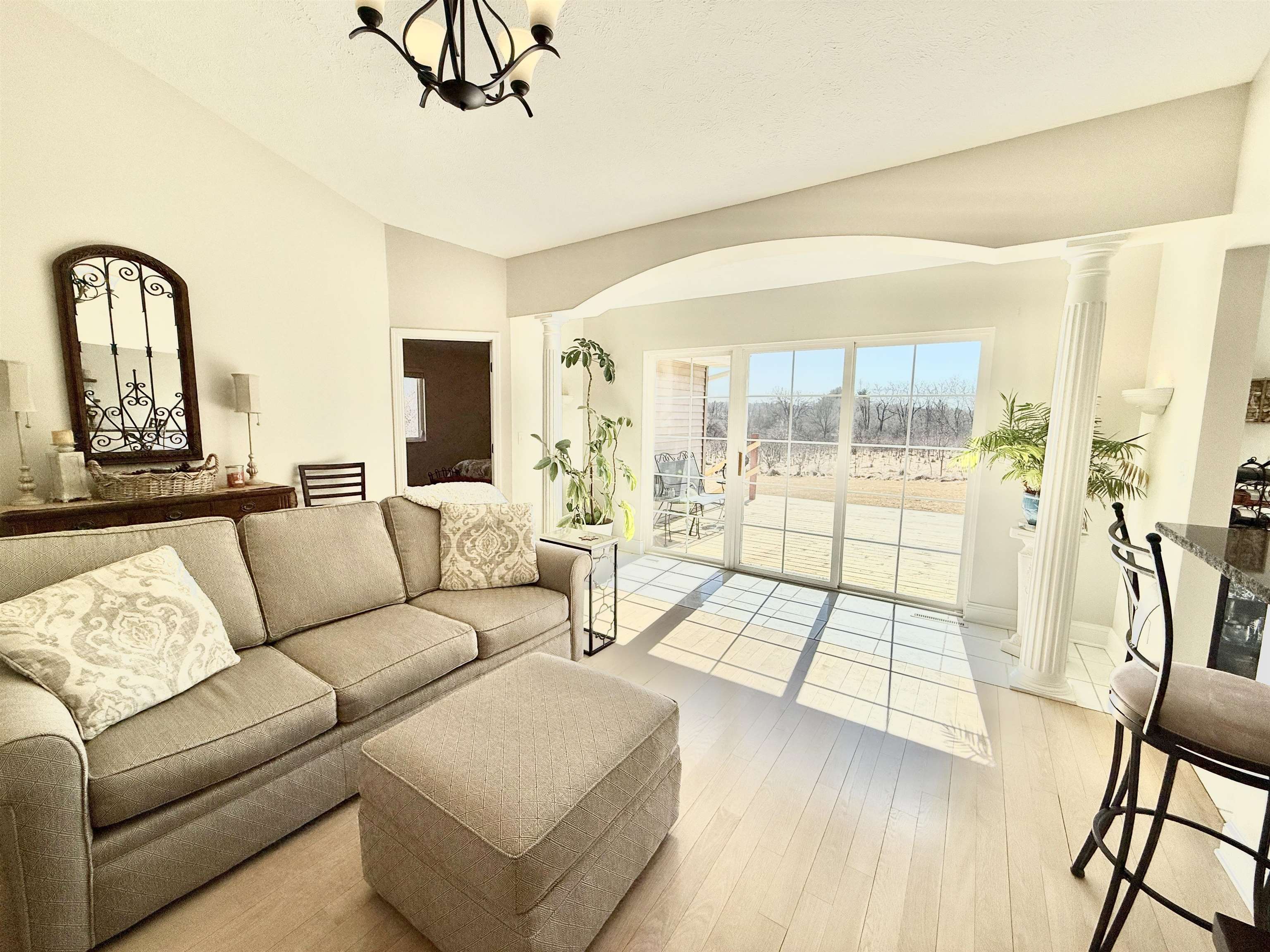 7188 Edwardsville Road Rockford, IL 61102 - Photo 14 of 73 a living room with furniture and a flat screen tv