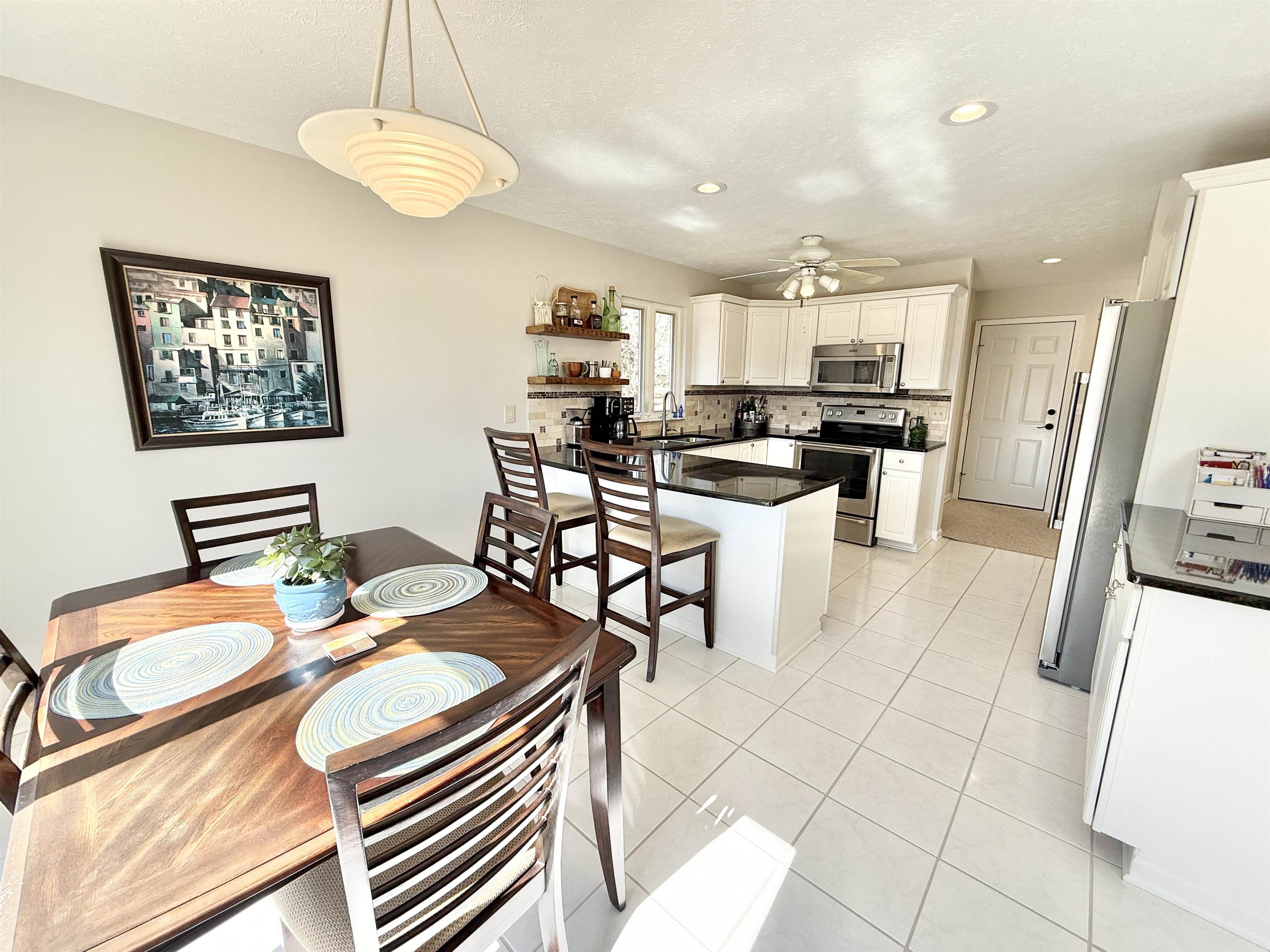 7188 Edwardsville Road Rockford, IL 61102 - Photo 15 of 73 a view of a dining room with furniture