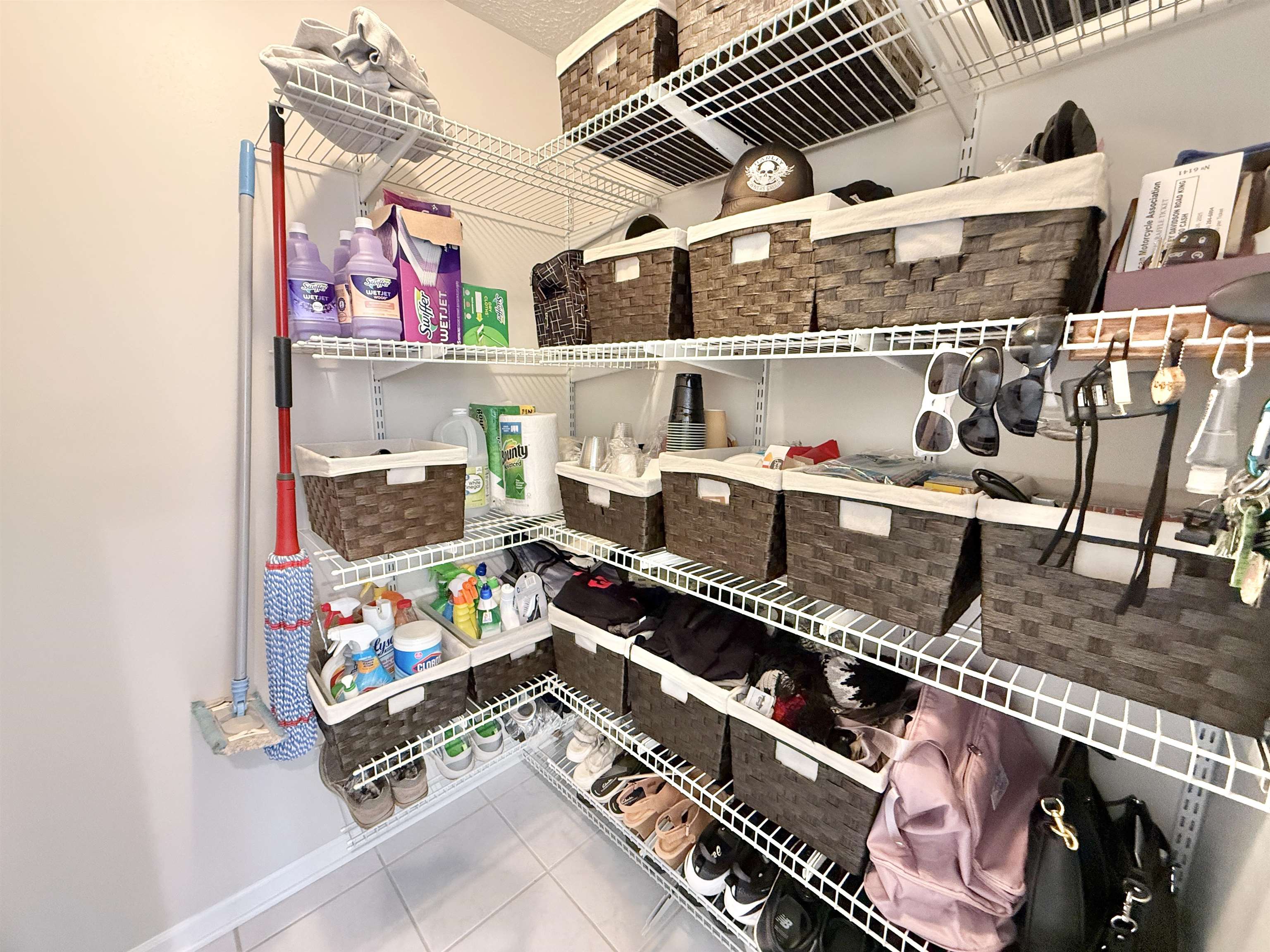 7188 Edwardsville Road Rockford, IL 61102 - Photo 24 of 73 a store room with lots of different colored cloths