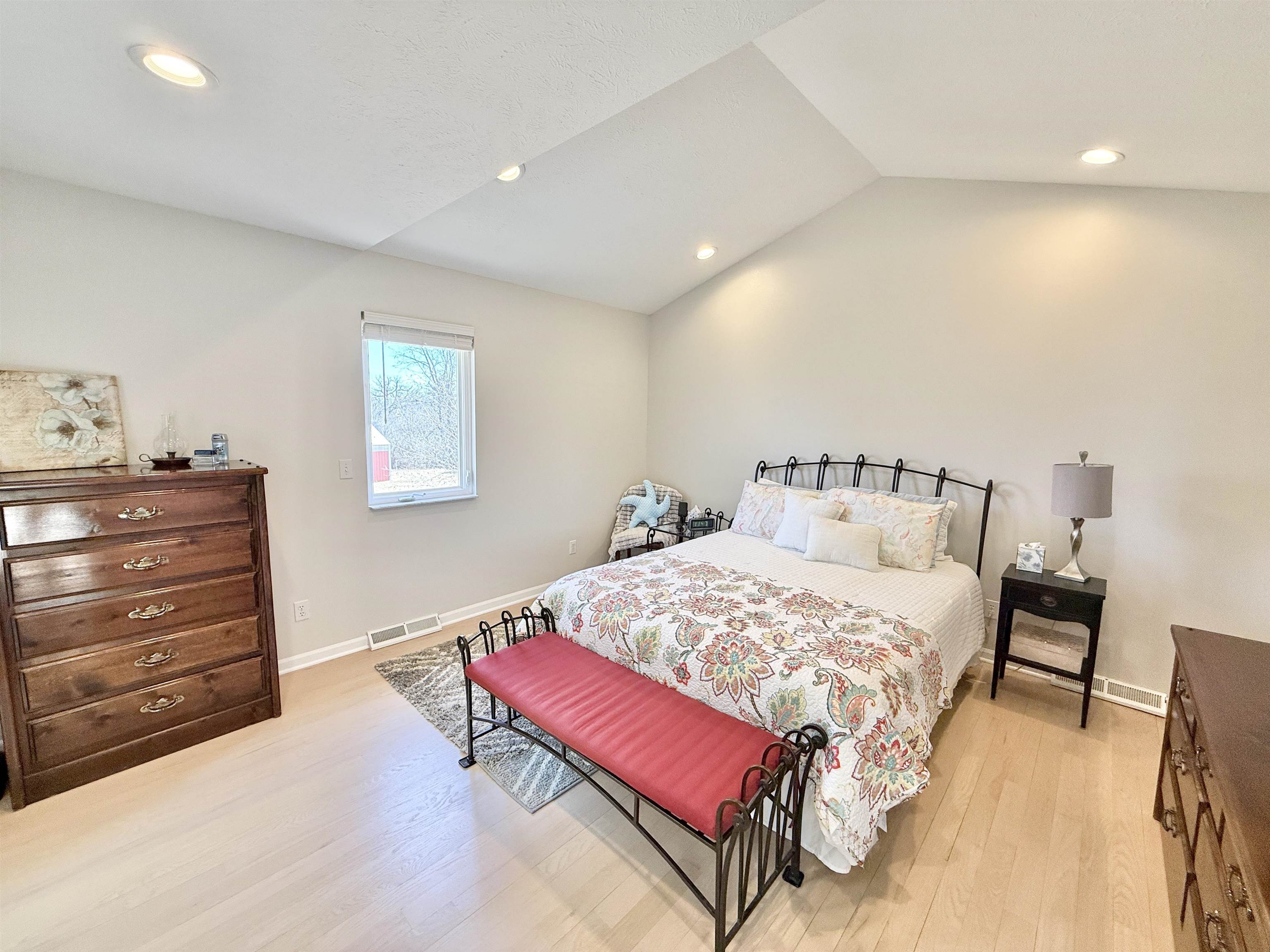 7188 Edwardsville Road Rockford, IL 61102 - Photo 28 of 73 a bedroom with a bed and a dresser