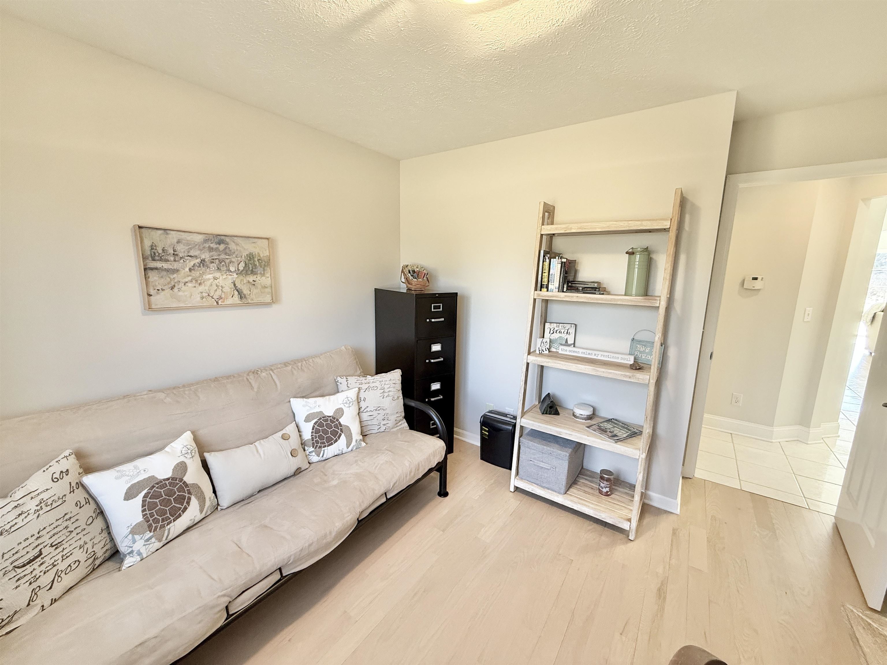 7188 Edwardsville Road Rockford, IL 61102 - Photo 34 of 73 a living room with furniture and a bed