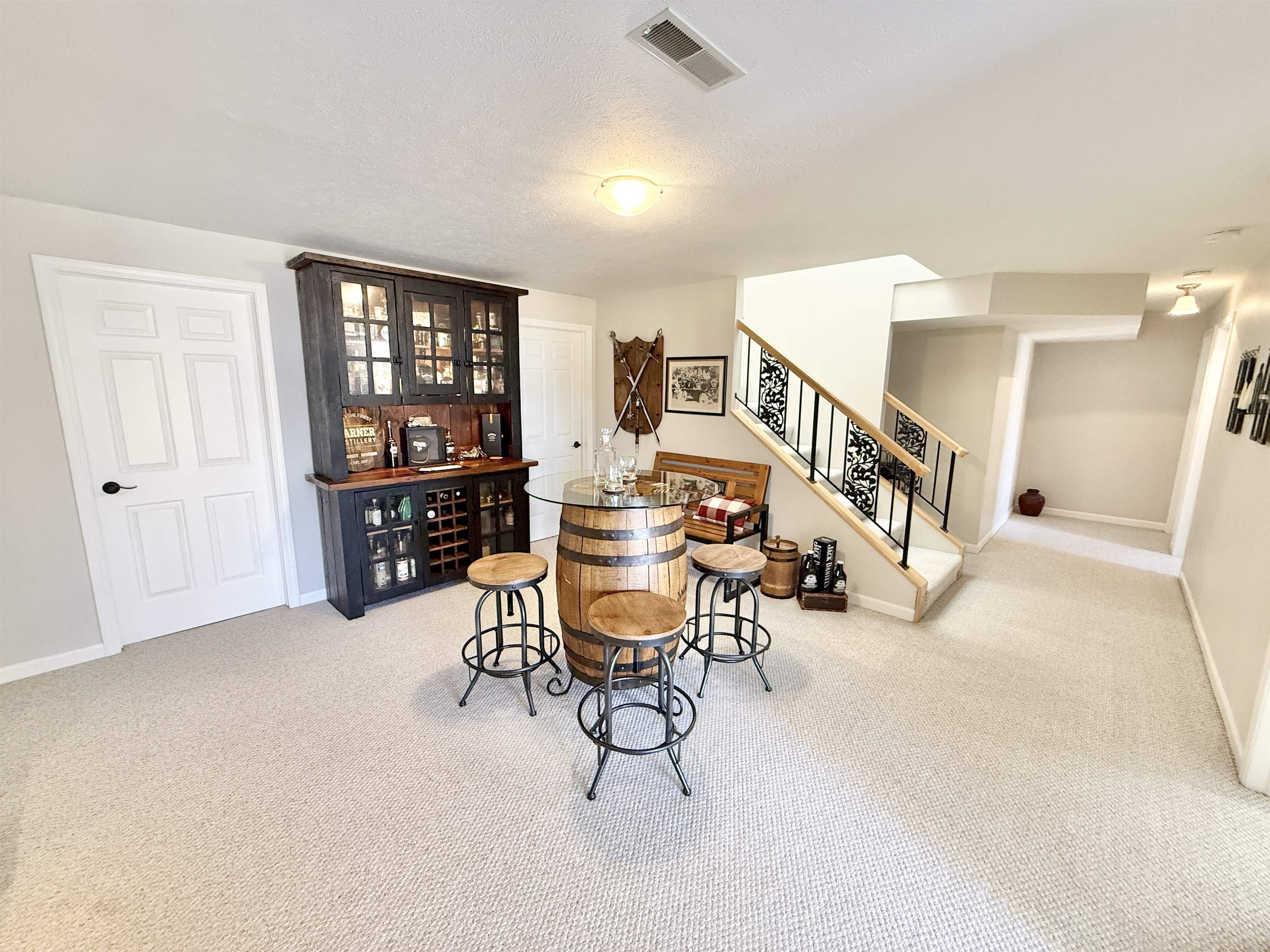 7188 Edwardsville Road Rockford, IL 61102 - Photo 36 of 73 a living room with furniture and a book shelf