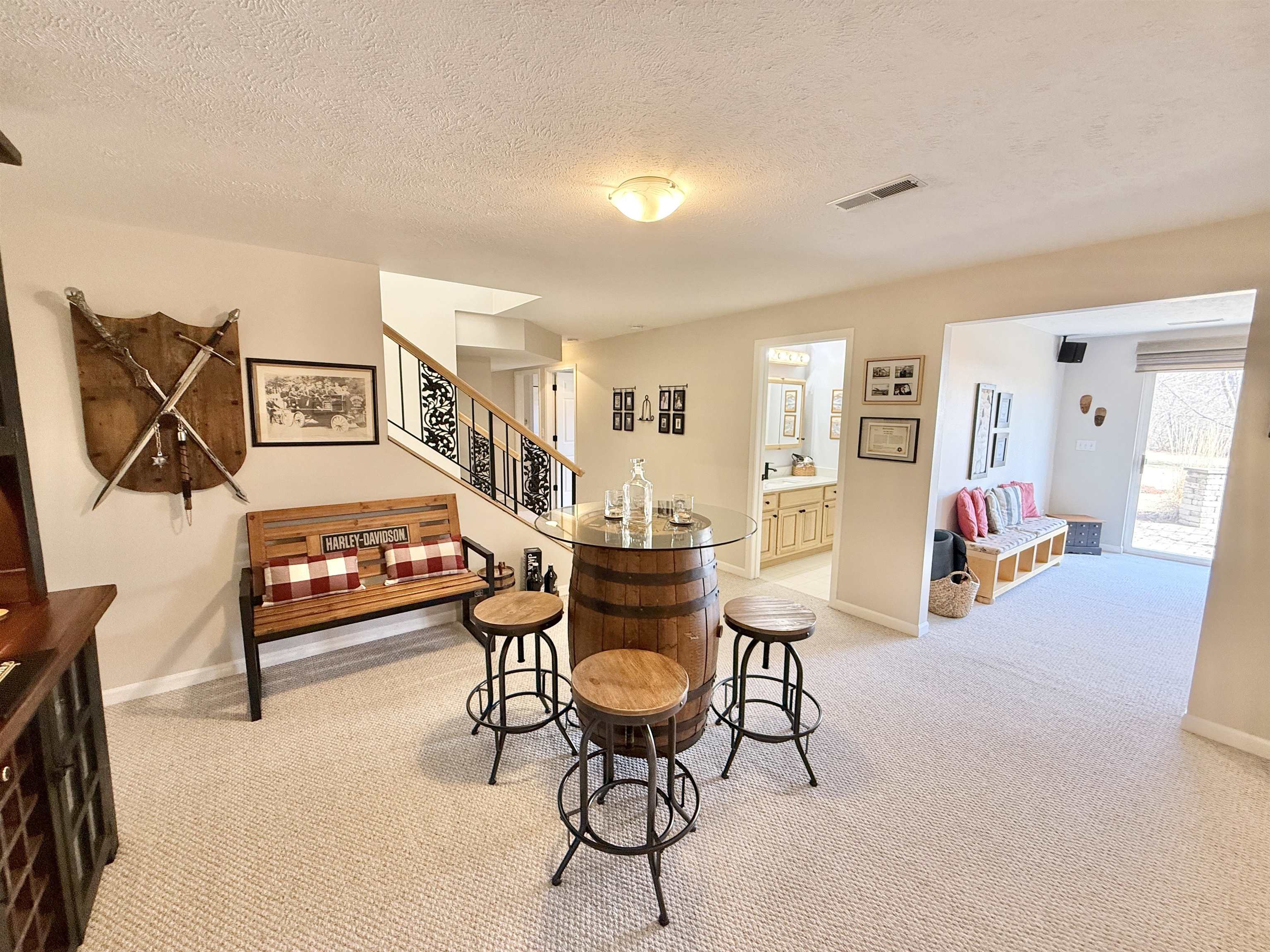 7188 Edwardsville Road Rockford, IL 61102 - Photo 37 of 73 a living room with furniture a dining table and chairs with wooden floor